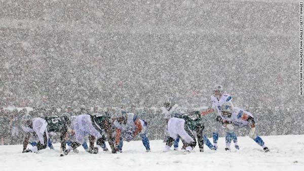 American Football - Heavy Winter Snow Hits East Coast Games
