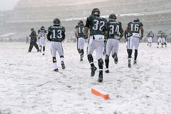 American Football - Heavy Winter Snow Hits East Coast Games